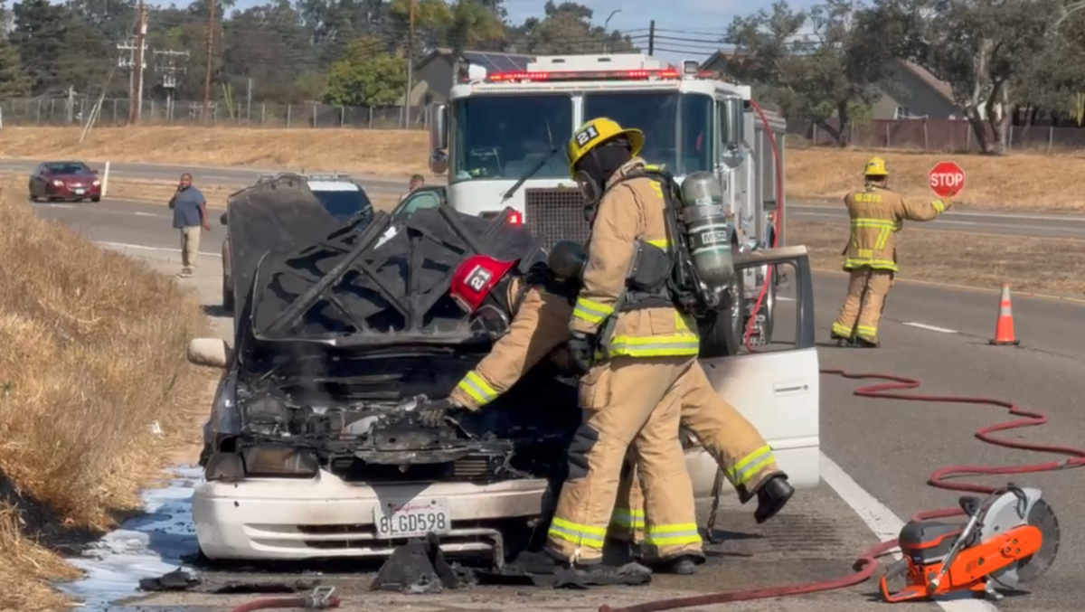 Firefighters extinguish car fire along southbound Highway 101 in Orcutt